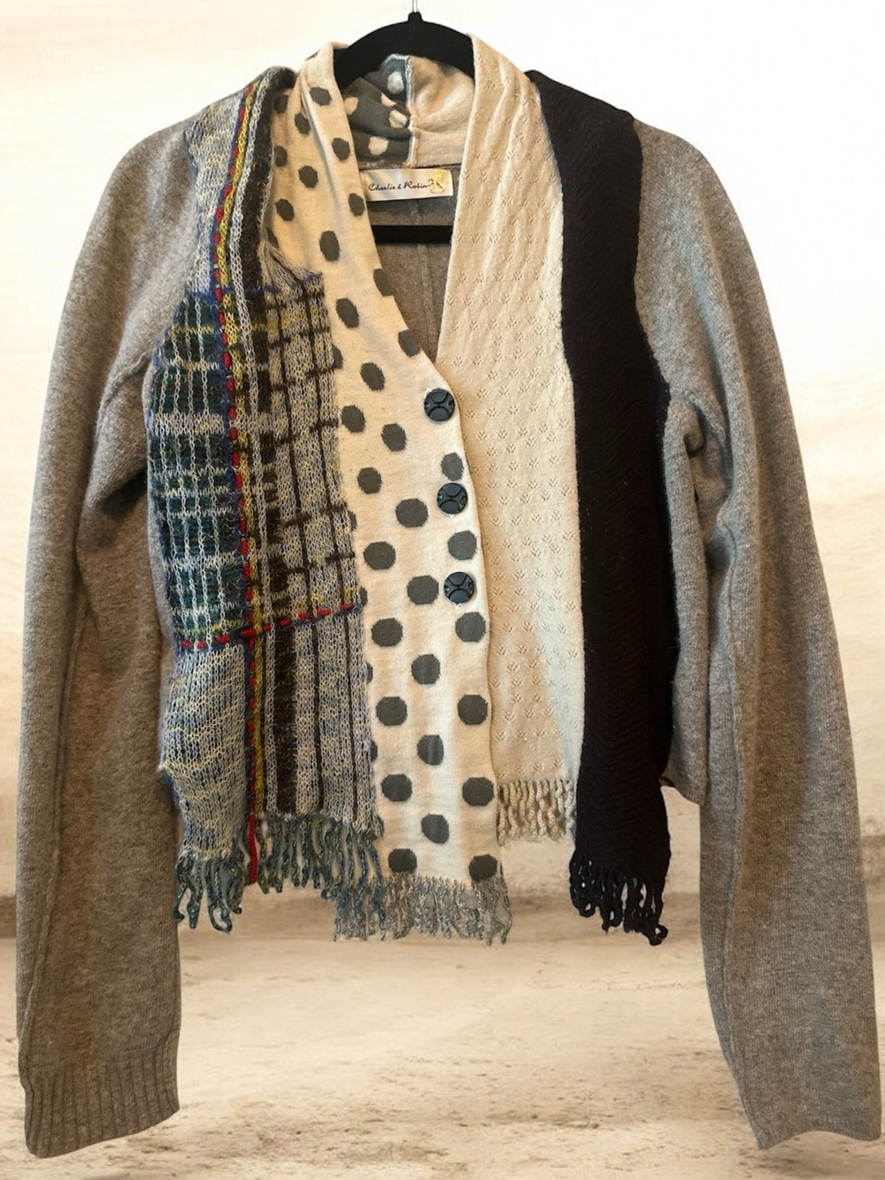 Charlie + Robin cardigan featuring mixed knit patterns and polka dot details.